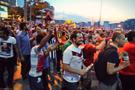 Sports fans, who played a large role in the protests in Istanbul, march through Taksim Square.