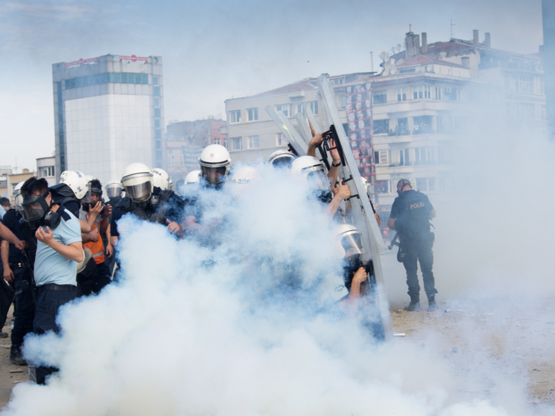 Police getting teargas back from protestors in Taksim